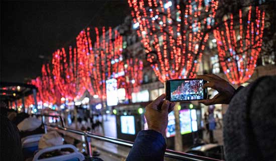 Christmas illumination in Paris by double-decker bus